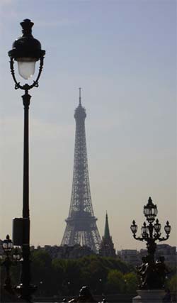 The Eiffel Tower beckons us