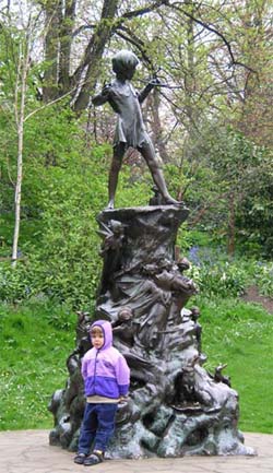 A would-be Peter Pan at the foot of the Peter Pan statue at Hyde Park