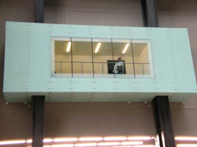A viewing room overlooking the large entry hall at the Tate Modern