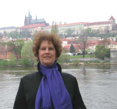 Carol at the Vlata River with the Castle in the background