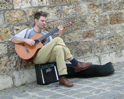 Street musician (nice classical guitar) on the banks of the Seine