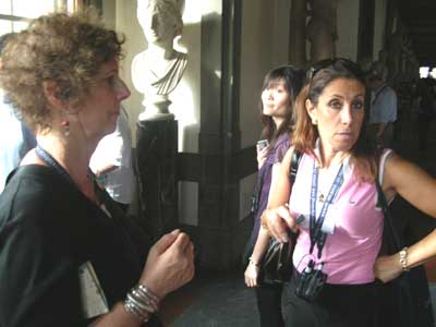 Carol and Fabianna discuss art at the Uffizi