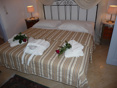 Our bed at our cave house at Lithes Traditional Homes on Santorini