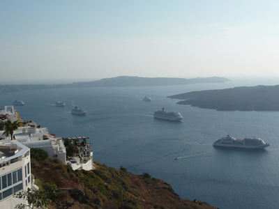 Cruise ships come and go in Santorini