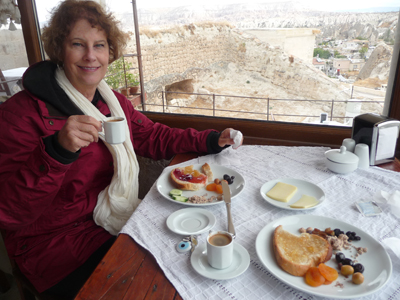 Carol enjoys breakfast at the hotel after our hot-air balloon ride