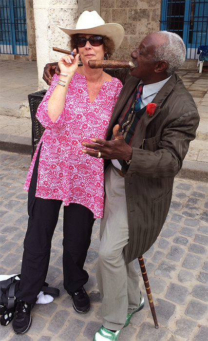 Carol with a character in Old Havana