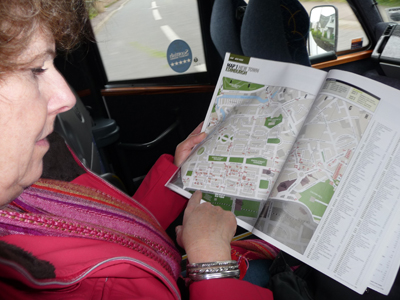 Carol checks the map