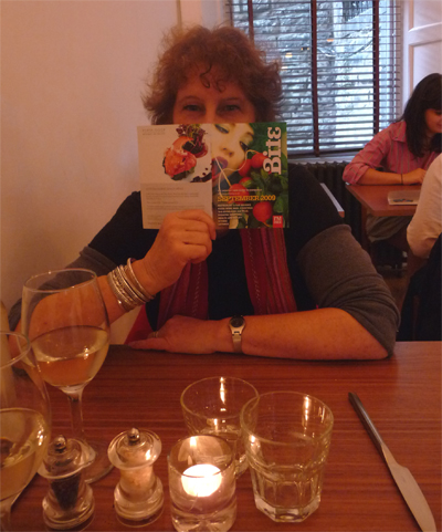 Carol hides behind the menu at Urban Angel in Edinburgh