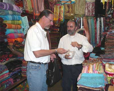 David purchases a scarf at the ancient Jaffa market