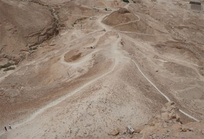 Looking down from the top of Masada at the remains of the earthen ramp built by the Romans