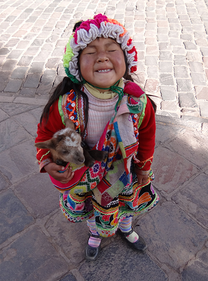 Little girl at the festival in Cuzco